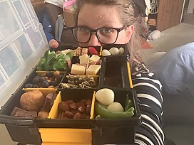 The very excited patient and her charcuterie tool box of yumminess